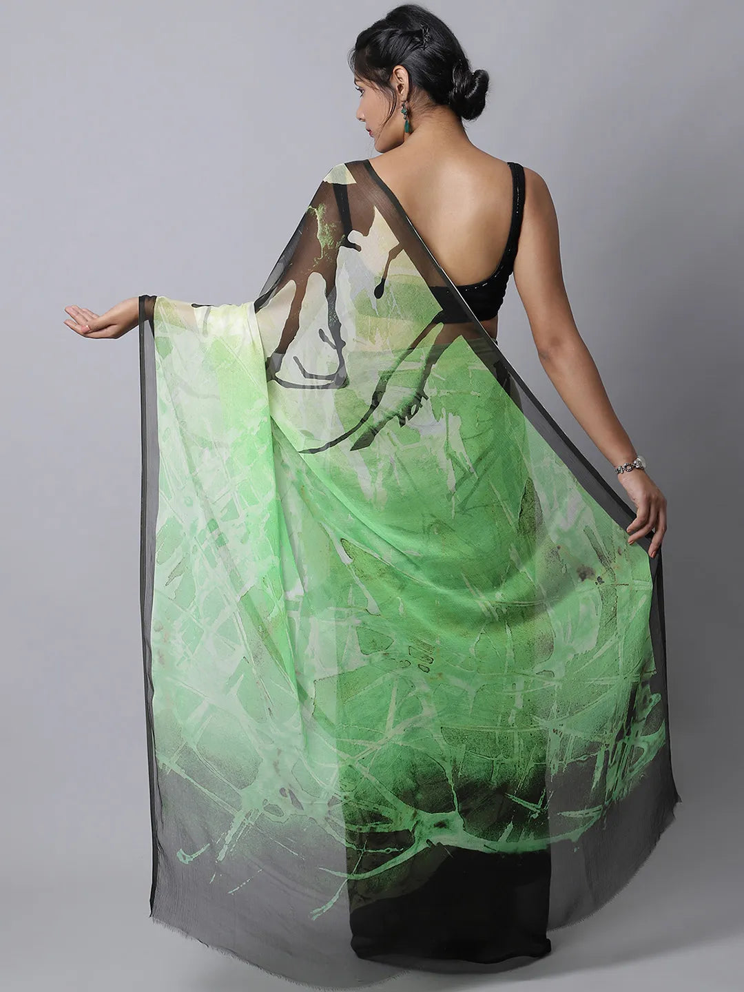 Fern Green Silk Chiffon Saree with nature-inspired patterns